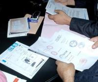 خطير ... حجز وثائق رسمية أصلية خاصة بالأمن الوطني عند بائع مواد غذائية بسلا