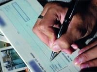 الرقم الأخضر للتبليغ عن الرشوة يطيح برئيس جماعة متلبسا بحيازة شيك قيمته 6 ملايين سنتيم