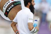 لاعب انجليزي يصر على ارتداء حمل شارة "أنقذوا غزة"