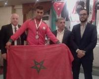 هذا هو البطل المغربي الفائز ببطولة العرب في الكيك بوكسينغ و الذي رفع راية المغرب بالأردن
