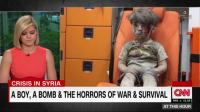 شاهد مذيعة CNN تبكي على الهواء عند مشاهدة  صور الطفل السوري عمران