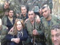 صورة : الفنانة السورية رغدة ببدلة عسكرية رفقة الجيش النظامي السوري !