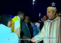 إمرأة ماليَة تتجنّب مصافحة الملك