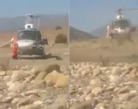 هبوط مفاجئ لطائرة هيلوكبتر وسط واد بوزان