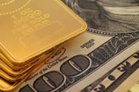 الذهب يتراجع بفعل قوة الدولار والأنظار على أزمة اليونان