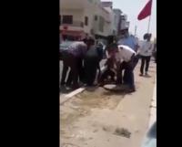 لحظة سقوط سيدة في "قادوس" أمام مرأى والي أكادير