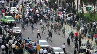 اشتباك بين مؤيدي ومعارضي الحكومة الايرانية في طهران