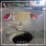 مواطن يحتج على اهمال تغطية بالوعة بطريقة مبتكرة !!