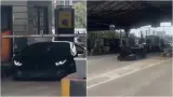 بالفيديو..صاحب سيارة لامبورغيني فاخرة يمرّ من تحت حاجز رسوم مغلق