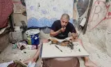 منظمة وطنية تجر "بن نسنس" إلى القضاء بعد نشره فيديو "شواء كلب" في عيد الأضحى