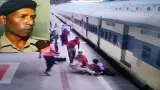 شرطي هندي ينقذ فتاة كاد القطار أن يسحقها